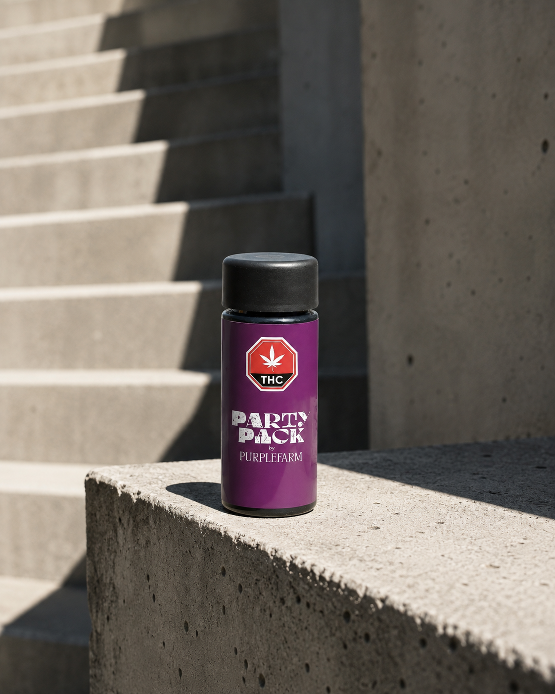 PURPLEFARM Party Pack pre-roll package on a sunlit concrete ledge
